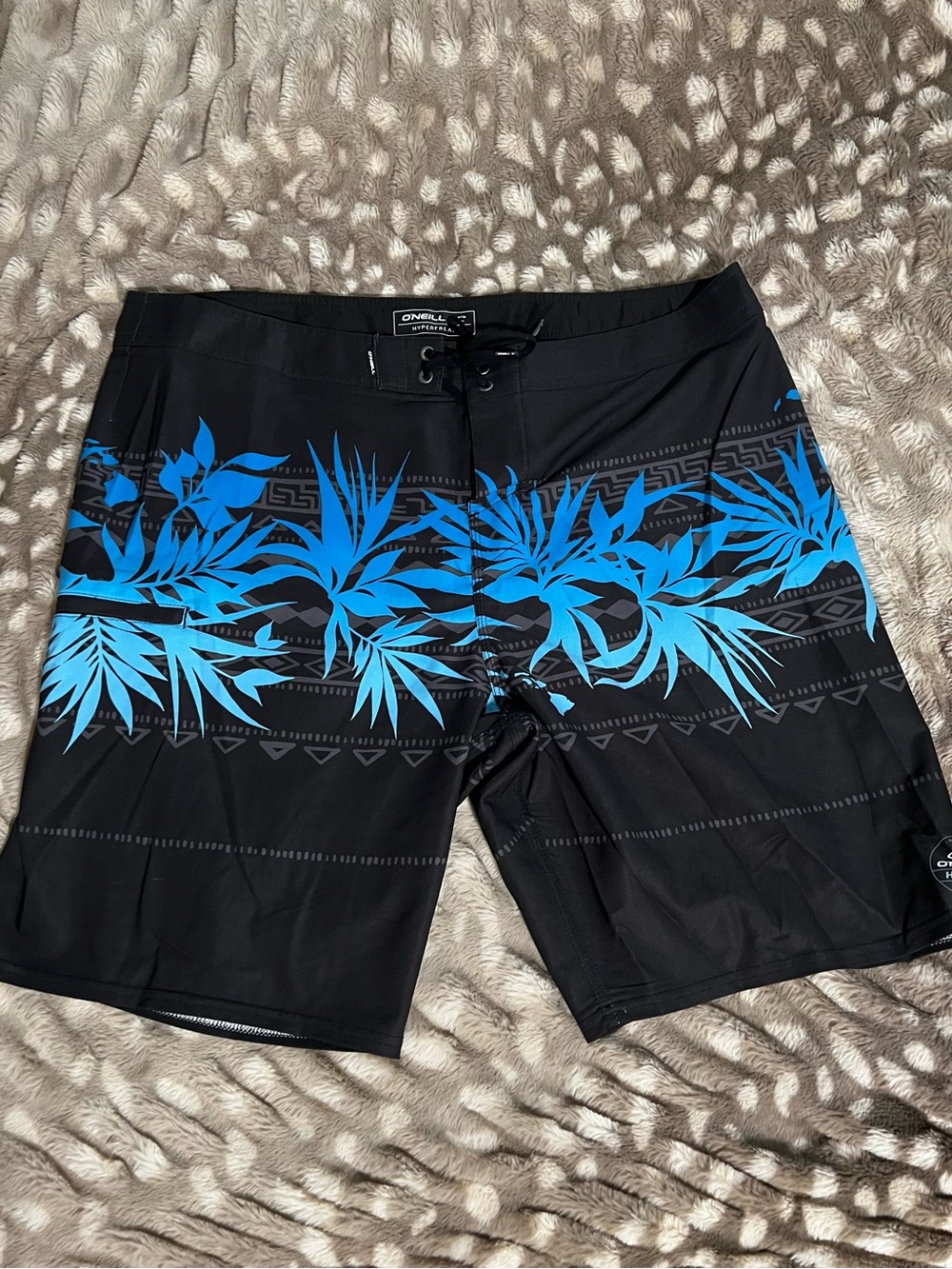 O'Neill Black Boardshorts with Bright Blue Tropical Print